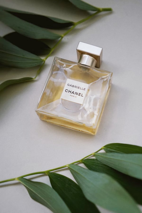 Gabrielle Chanel Paris perfume bottle on a light surface.